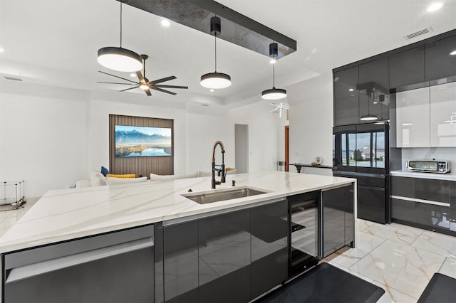 193 Stargrass Dr, Auburndale, FL 33823 - kitchen featuring a sink, stainless steel dishwasher, modern cabinets, and a ceiling fan