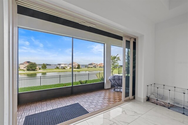 193 Stargrass Dr, Auburndale, FL 33823 - spare room with a water view, marble finish flooring, and baseboards