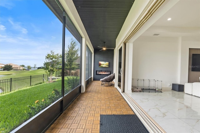 193 Stargrass Dr, Auburndale, FL 33823 - sunroom with a fireplace