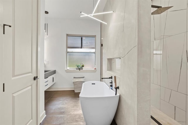 193 Stargrass Dr, Auburndale, FL 33823 - full bathroom with walk in shower, a soaking tub, and baseboards