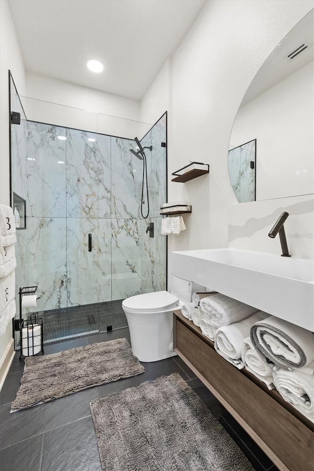 193 Stargrass Dr, Auburndale, FL 33823 - full bath with a marble finish shower, vanity, toilet, and recessed lighting