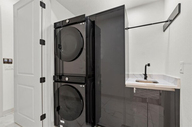 193 Stargrass Dr, Auburndale, FL 33823 - washroom with stacked washing machine and dryer