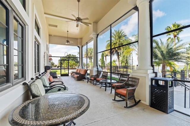 193 Stargrass Dr, Auburndale, FL 33823 - sunroom featuring ceiling fan, a towering ceiling, and ornate columns
