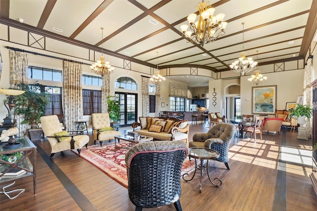 193 Stargrass Dr, Auburndale, FL 33823 - living area with a chandelier, arched walkways, wood finished floors, and crown molding