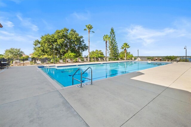 193 Stargrass Dr, Auburndale, FL 33823 - community pool featuring a patio area