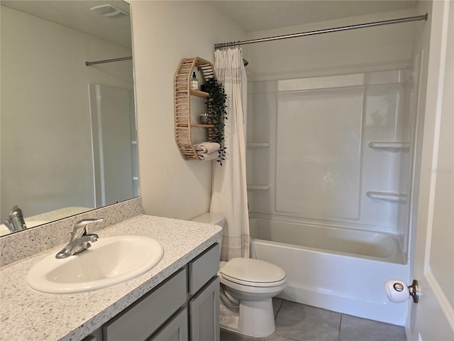 full bathroom with vanity, shower / tub combo with curtain, tile patterned flooring, and toilet