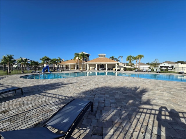 view of pool featuring a patio