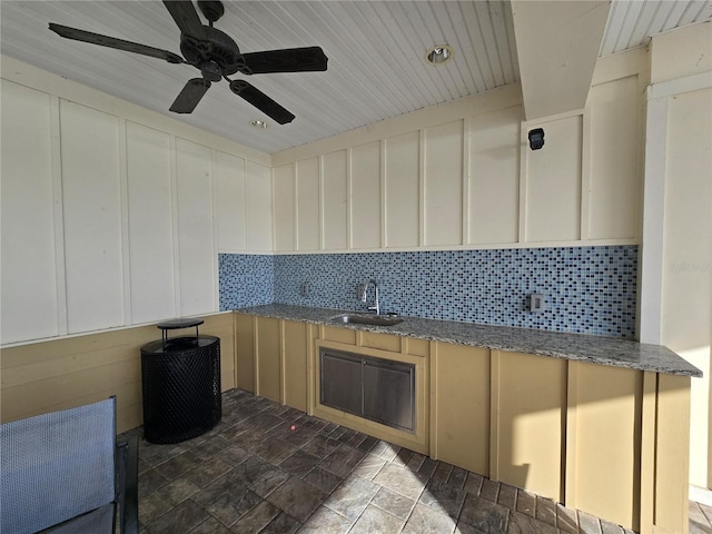 view of patio featuring sink and ceiling fan