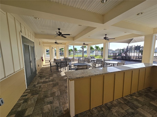 view of patio / terrace with ceiling fan