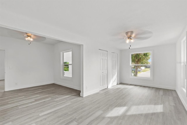 unfurnished room with light hardwood / wood-style floors and ceiling fan