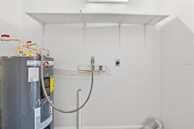 utility room featuring water heater