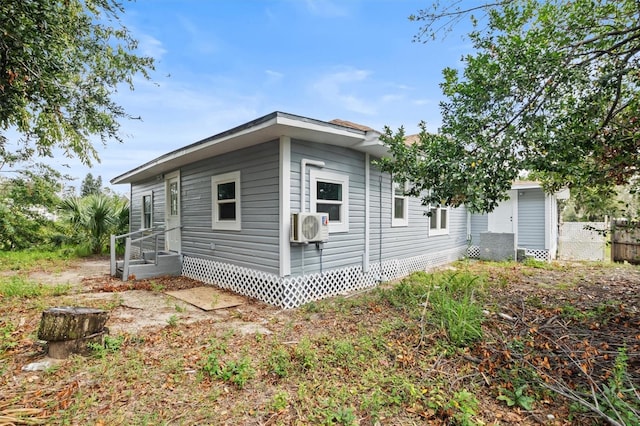 view of property exterior with ac unit