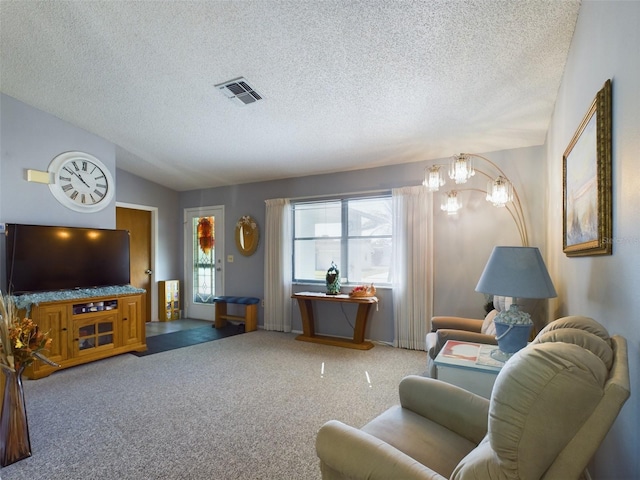 living room with carpet, a notable chandelier, a textured ceiling, and vaulted ceiling