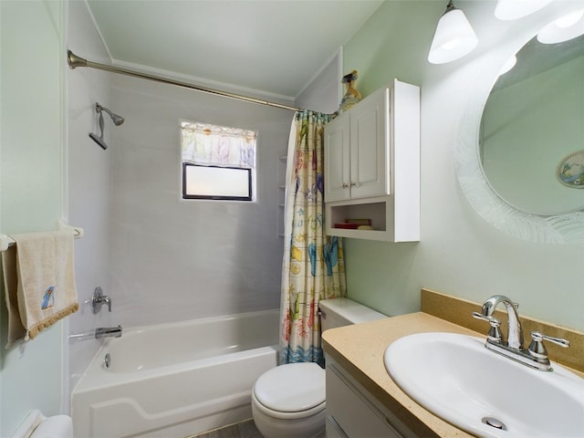 full bathroom with vanity, shower / bath combo with shower curtain, and toilet