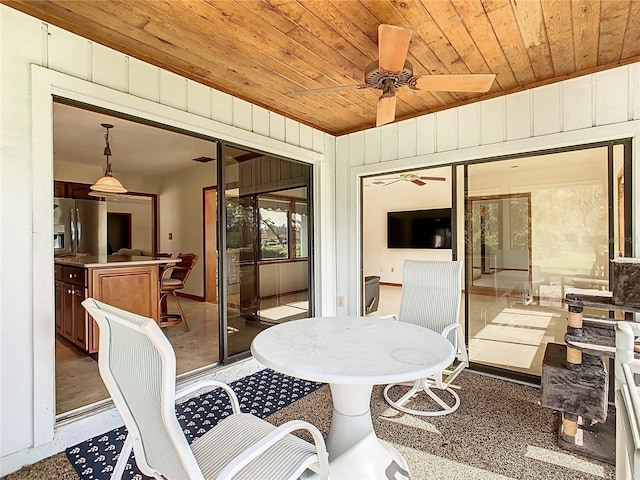 view of patio / terrace featuring ceiling fan