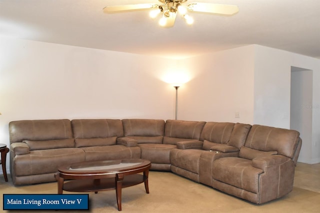 living room featuring light carpet and ceiling fan