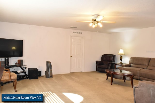 living room featuring a ceiling fan, light colored carpet, and visible vents