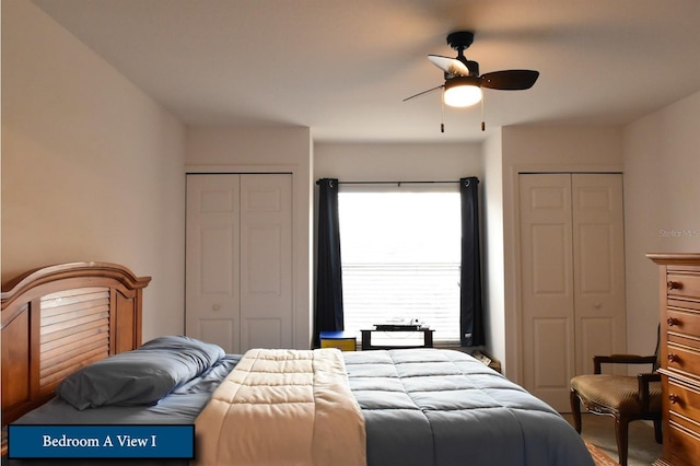 bedroom featuring a ceiling fan and multiple closets