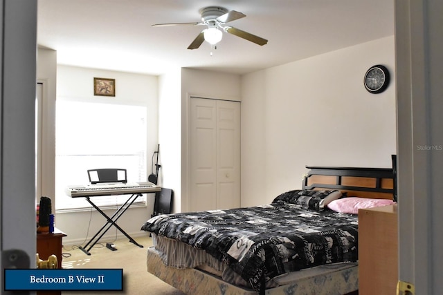 carpeted bedroom with a ceiling fan, baseboards, and a closet