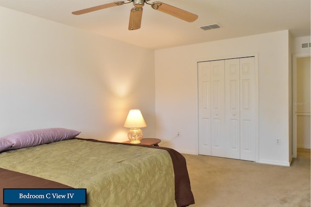 bedroom with light carpet, baseboards, a closet, and visible vents