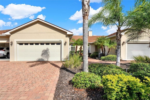 view of front of property with a garage