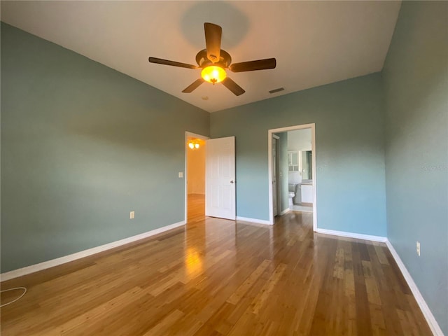 unfurnished bedroom featuring ceiling fan and hardwood / wood-style floors