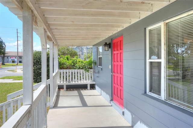 view of patio featuring a porch