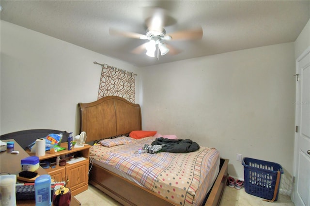 bedroom with light colored carpet and ceiling fan