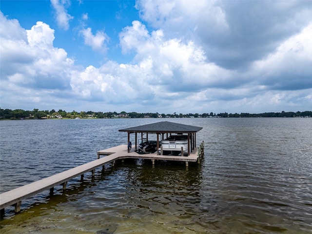 view of dock with a water view