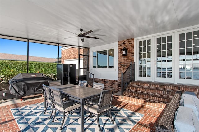 view of patio / terrace with a grill, ceiling fan, and french doors