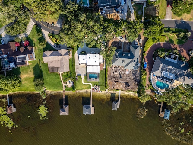 bird's eye view with a water view