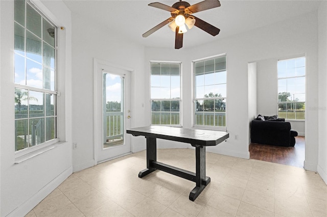 interior space featuring ceiling fan