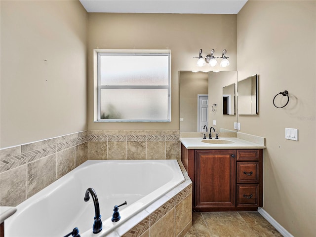 full bath with a garden tub and vanity