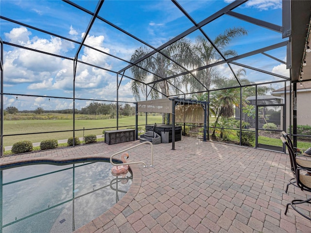 view of patio with glass enclosure, a hot tub, and an outdoor pool