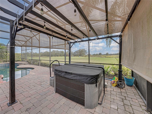 sunroom with a jacuzzi