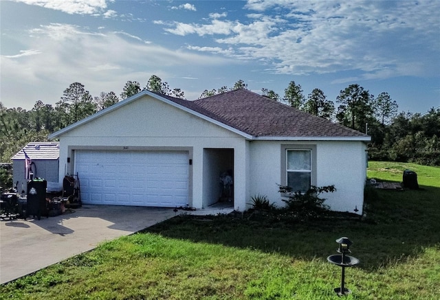 single story home featuring a garage and a front yard