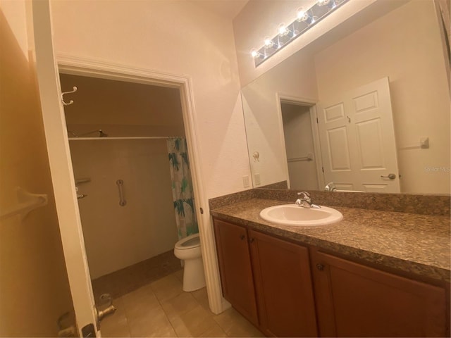 bathroom with curtained shower, tile patterned flooring, vanity, and toilet