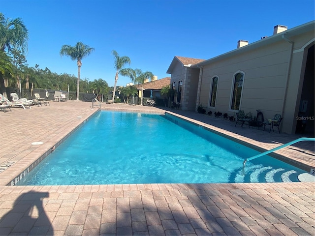 view of pool with a patio