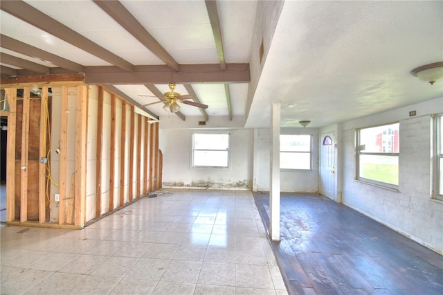 basement with ceiling fan