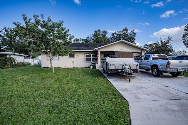 ranch-style home featuring a front lawn