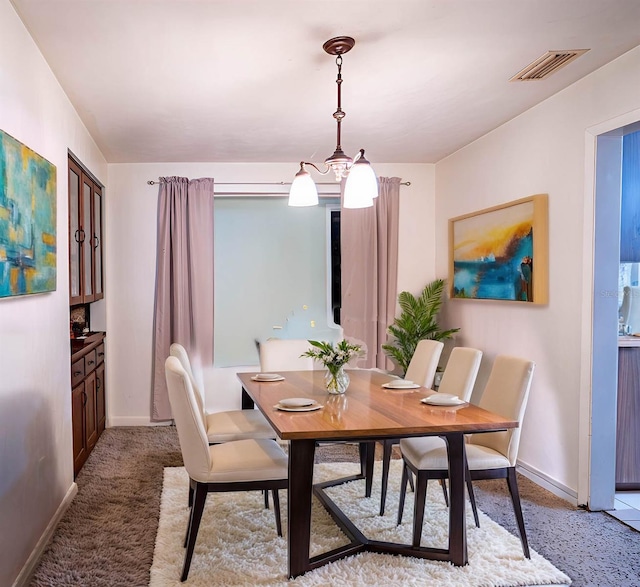 view of carpeted dining room