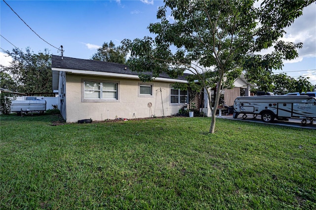 view of front of property with a front lawn