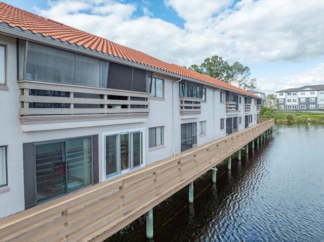 exterior space with a water view