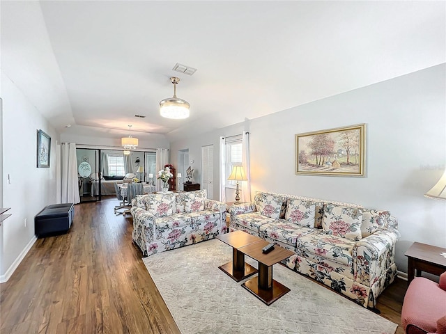 living room featuring hardwood / wood-style floors and a wealth of natural light