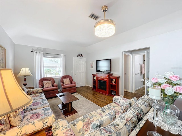 living room with dark hardwood / wood-style floors