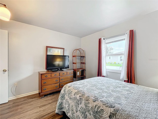 bedroom featuring light hardwood / wood-style floors