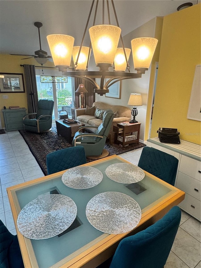 tiled dining room with ceiling fan