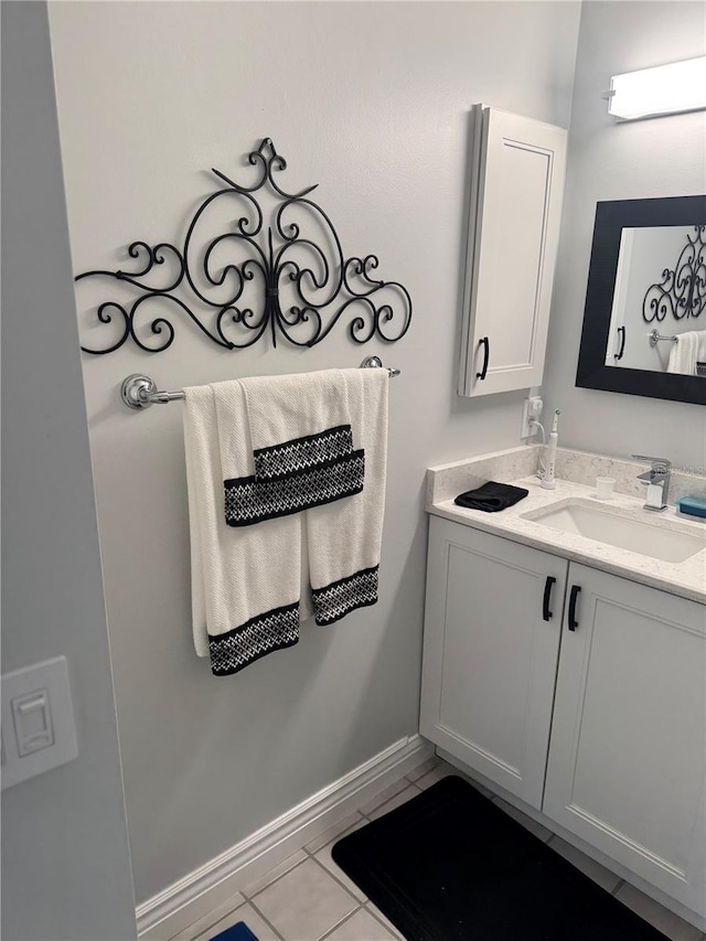 bathroom featuring tile patterned floors and vanity