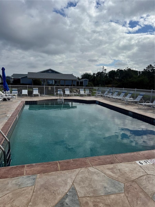 view of pool with a patio area