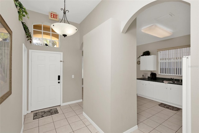 entrance foyer with light tile patterned floors